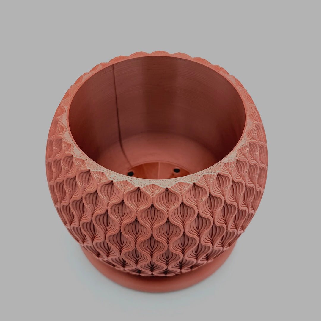 Rose gold lotus indoor planter pot view on inside pot with drainage holes