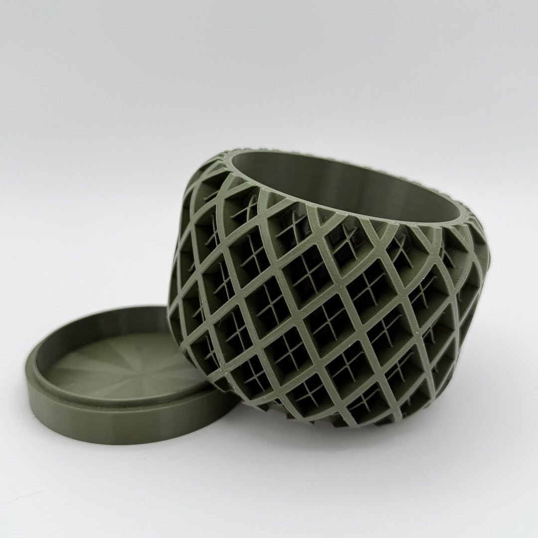 olive geoplaid 3d printed planter tilted on tray
